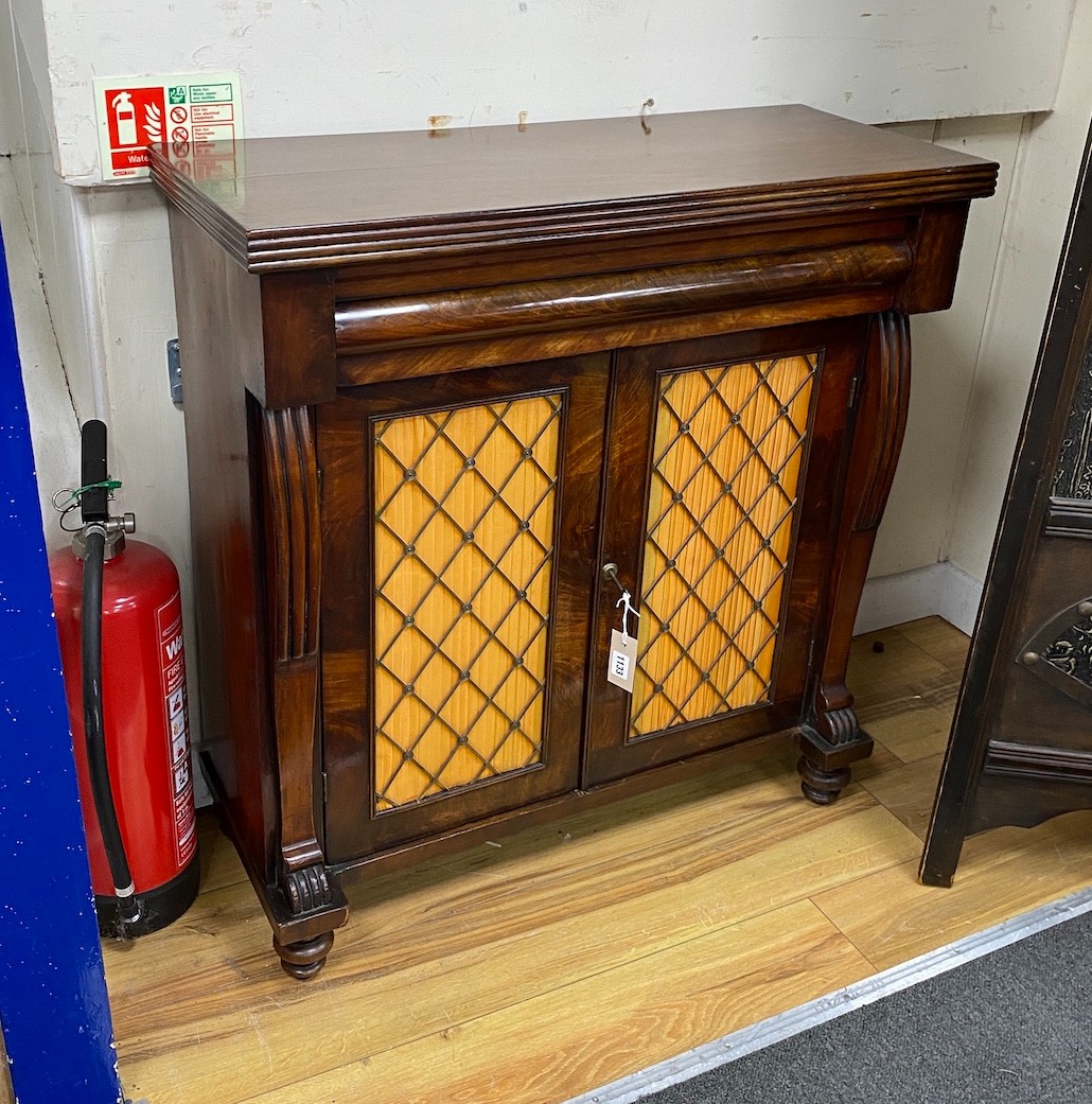 A William IV mahogany chiffonier, with pleated silk and brass grille doors, height 89cm, width 84cm, depth 35cm